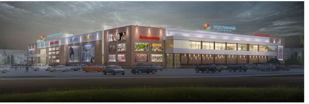 Фасад торгового центра Kostanay Plaza в вечернем освещении